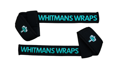 A pair of black cotton lifting straps with neoprene padding and silicone grip, featuring the logo 'Whitmans Wraps'.